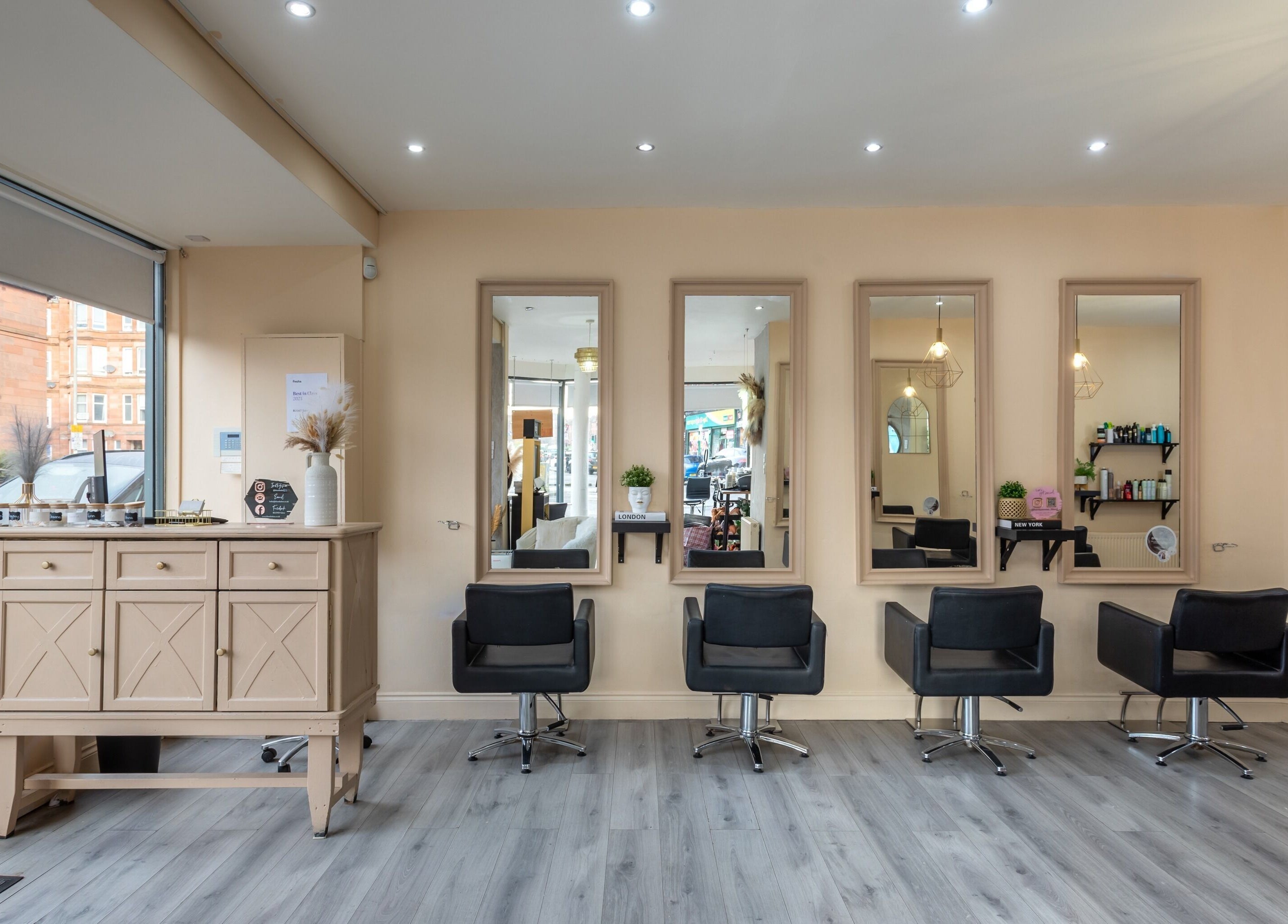 BLOND Salon interior with stylish chairs and mirrors in Glasgow, Scotland, GB.