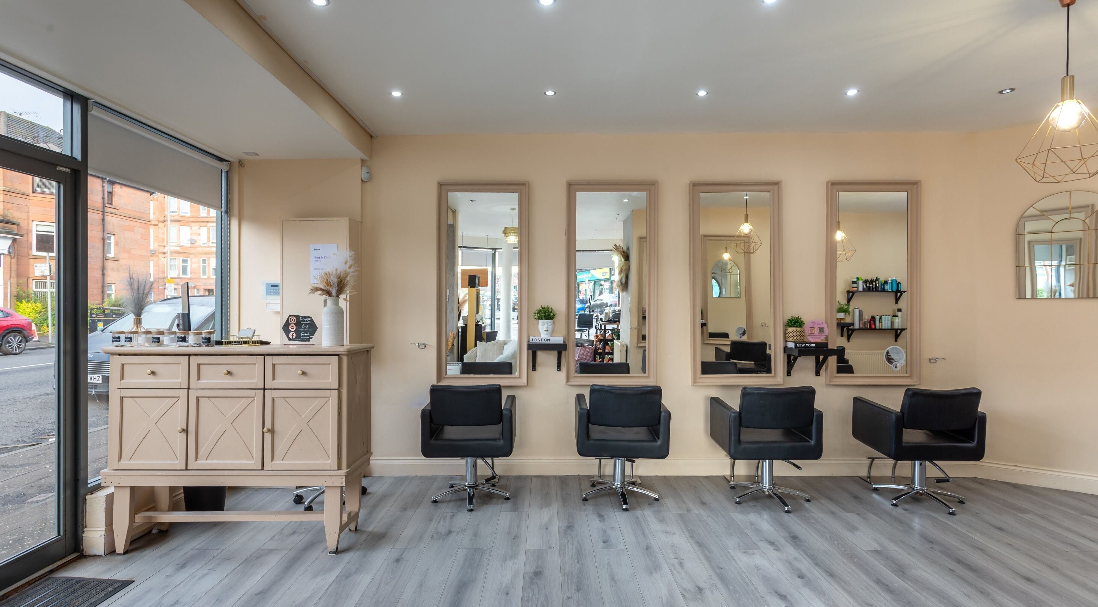 BLOND Salon interior with stylish chairs and mirrors in Glasgow, Scotland, GB.