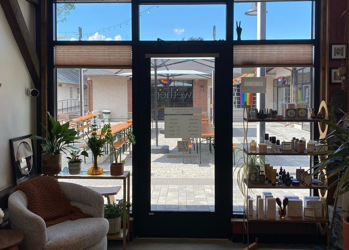 Cozy Bellwether Salon lounge area with plants and decor in Boston, Massachusetts, US.