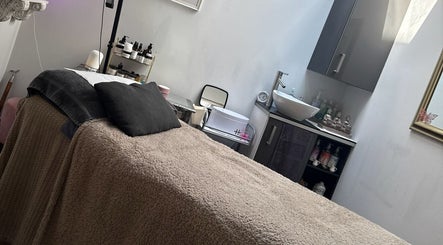 Luxurious treatment room at Butterfly Beauty in Longridge, England, GB featuring soft textures and natural decor.