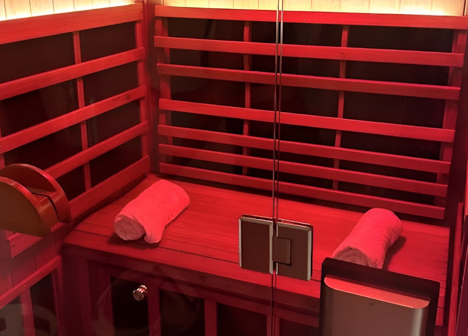 Cozy infrared sauna at Nimbus Co Richmond, Richmond, Victoria, AU, featuring wooden seating and soft lighting.