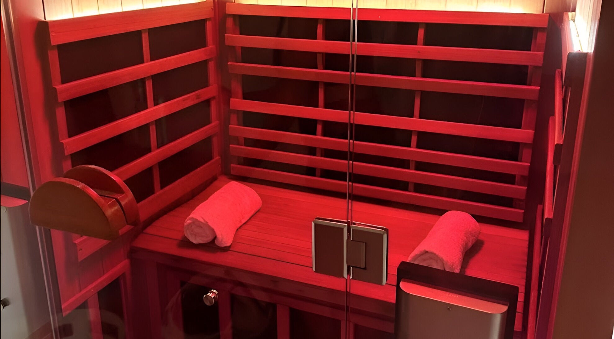 Cozy infrared sauna at Nimbus Co Richmond, Richmond, Victoria, AU, featuring wooden seating and soft lighting.