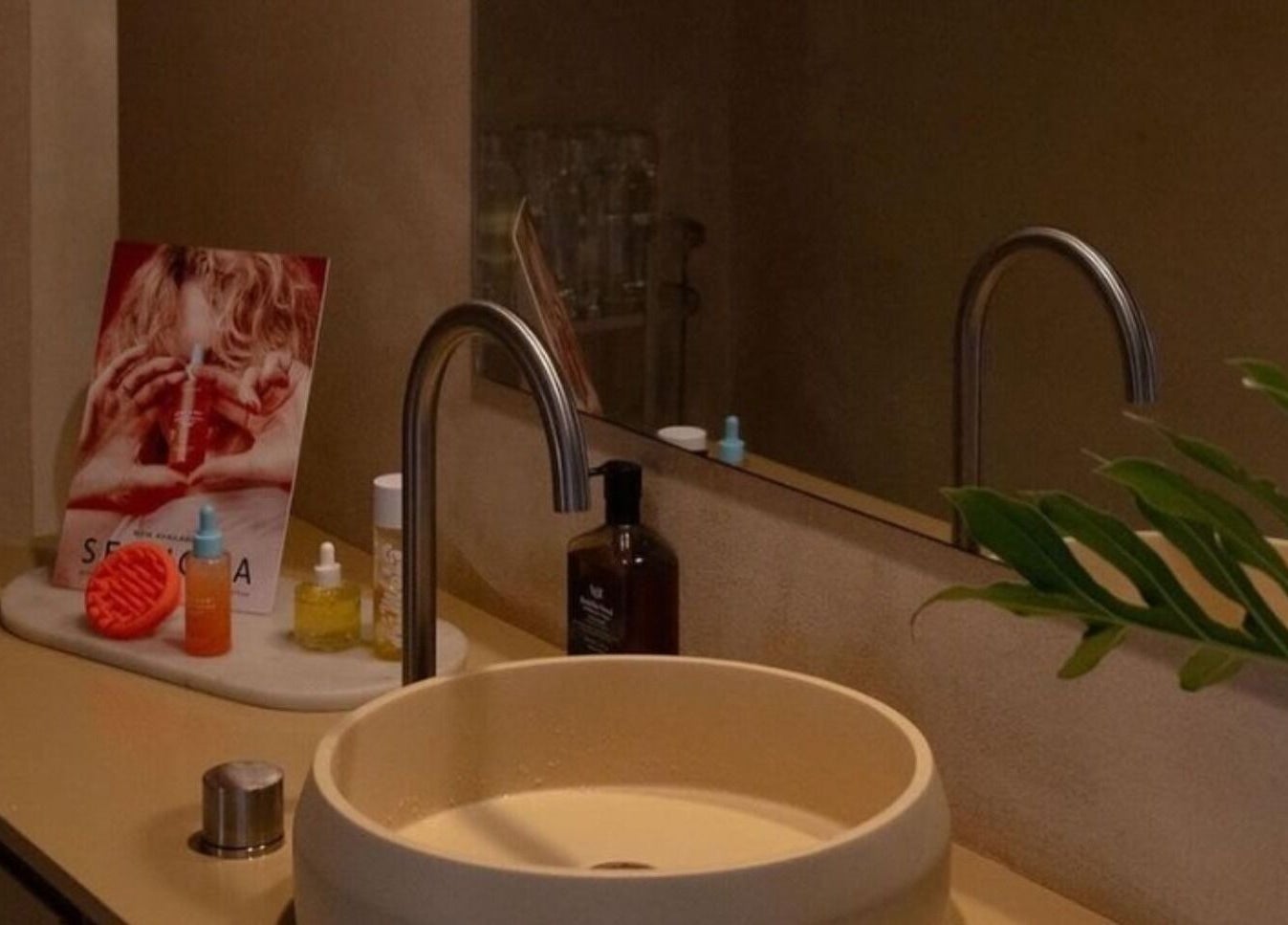 Elegant restroom setup at Nimbus Co Richmond, Richmond, Victoria, AU featuring a stylish sink and beauty products.