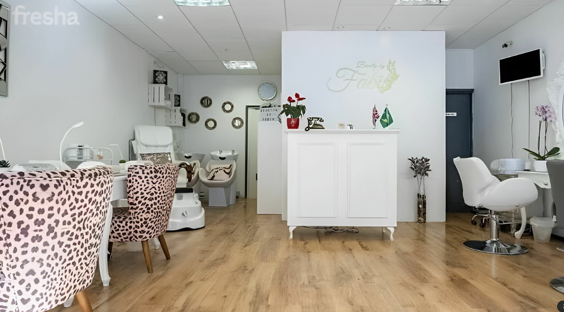 Stylish interior of Beauty by Fabi salon in Camberley, England, GB, showcasing modern decor and elegant design.