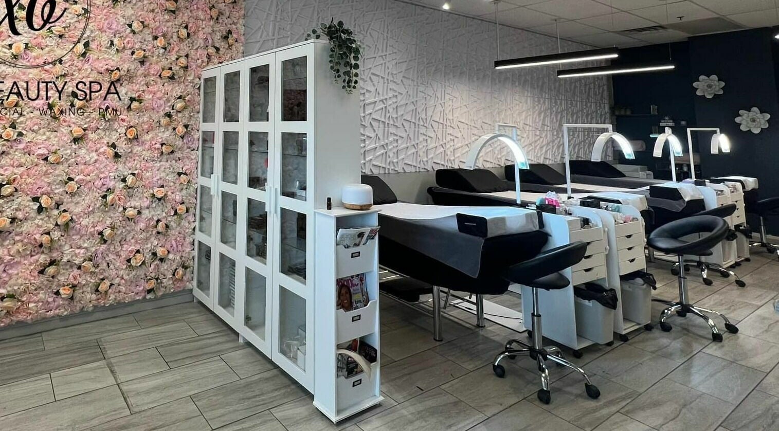 Elegant interior of XO Beauty Spa with floral wall in Chatham, Illinois, US.