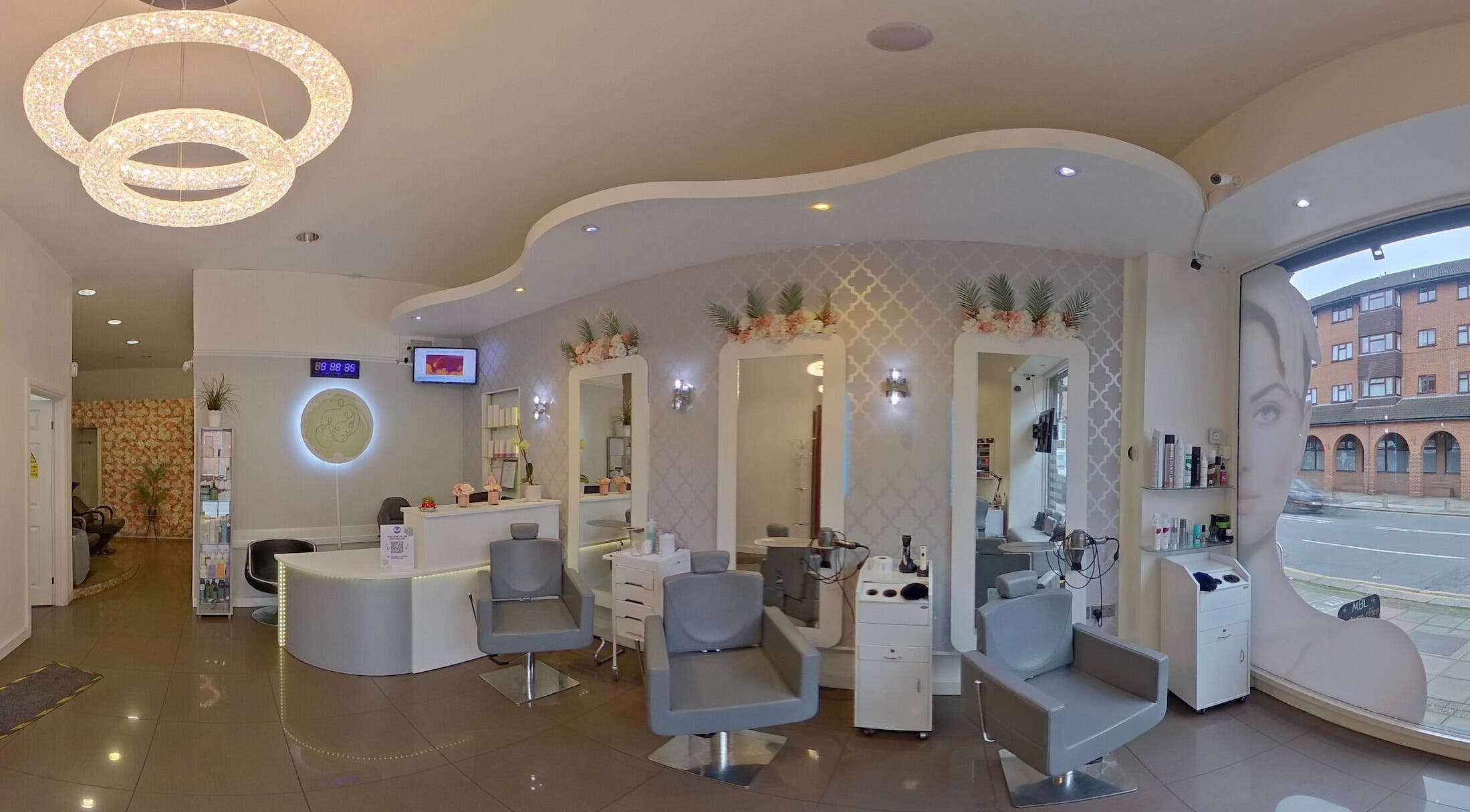Spacious interior of Mitra Beauty Land, London, England, GB with luxurious decor and styling stations.