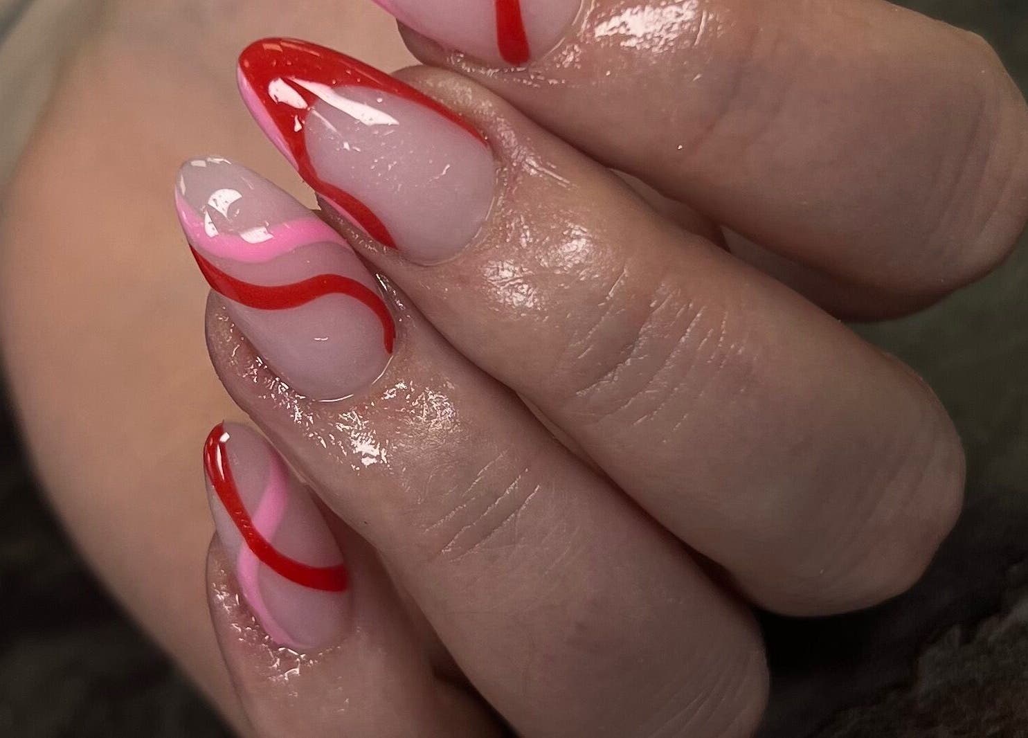 Stylish red and pink nail art at Vanilla Salon, Leeds, England, GB. Perfect manicure for a chic look.