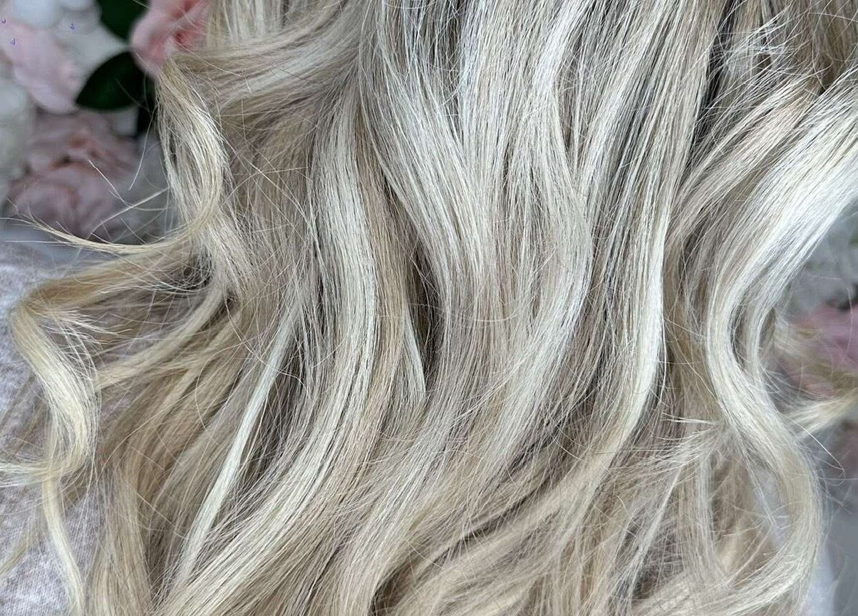 Flowing blonde hair styled at Vanilla Salon, Leeds, England, GB, showcasing expert hairdressing techniques.