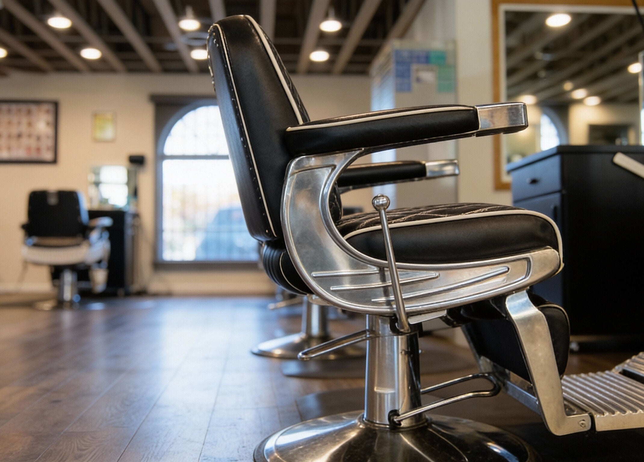 Modern barbershop interior at A Better U Beauty Barber Academy, Albuquerque, New Mexico, US.