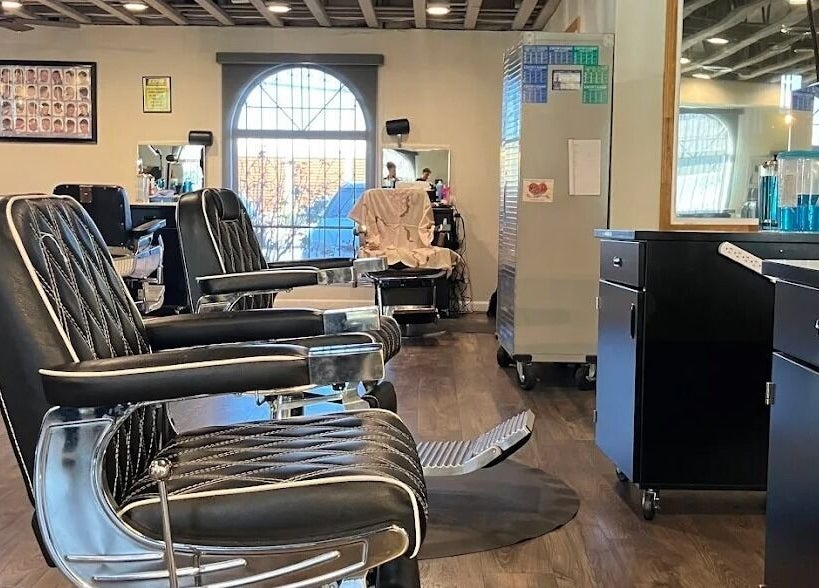 Modern barber chairs at A Better U Beauty Barber Academy, Albuquerque, New Mexico, US, offering premium services.