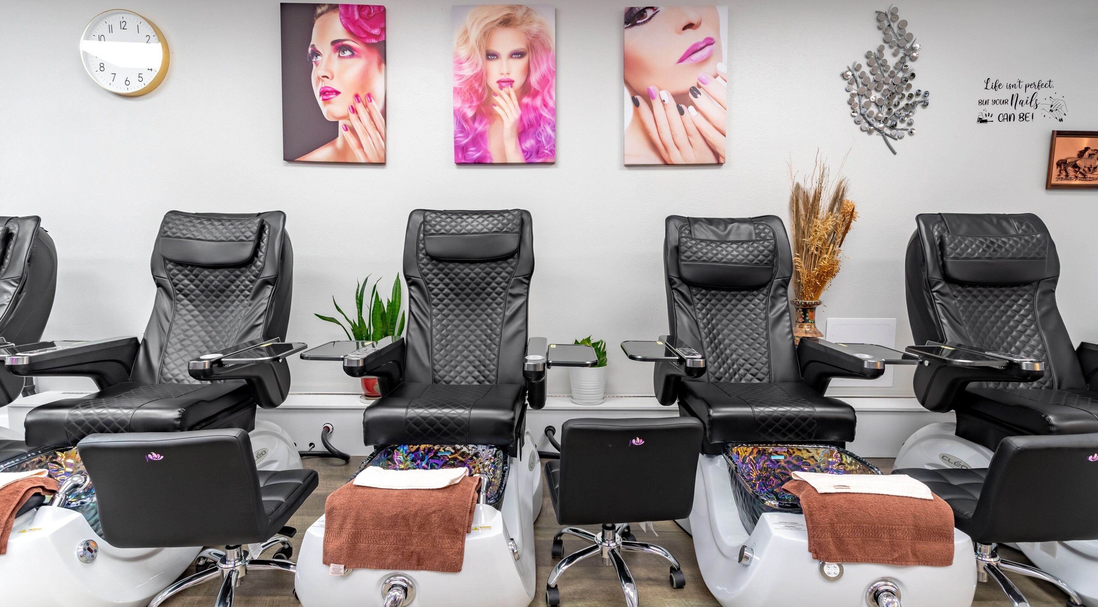 Luxurious pedicure chairs at Jenny Nails Salon in Seattle, Washington, US, offering a relaxing experience.