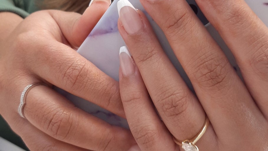 French manicure at Kristy Does Nails, Melbourne, Victoria, AU. Stylish hands with rings.