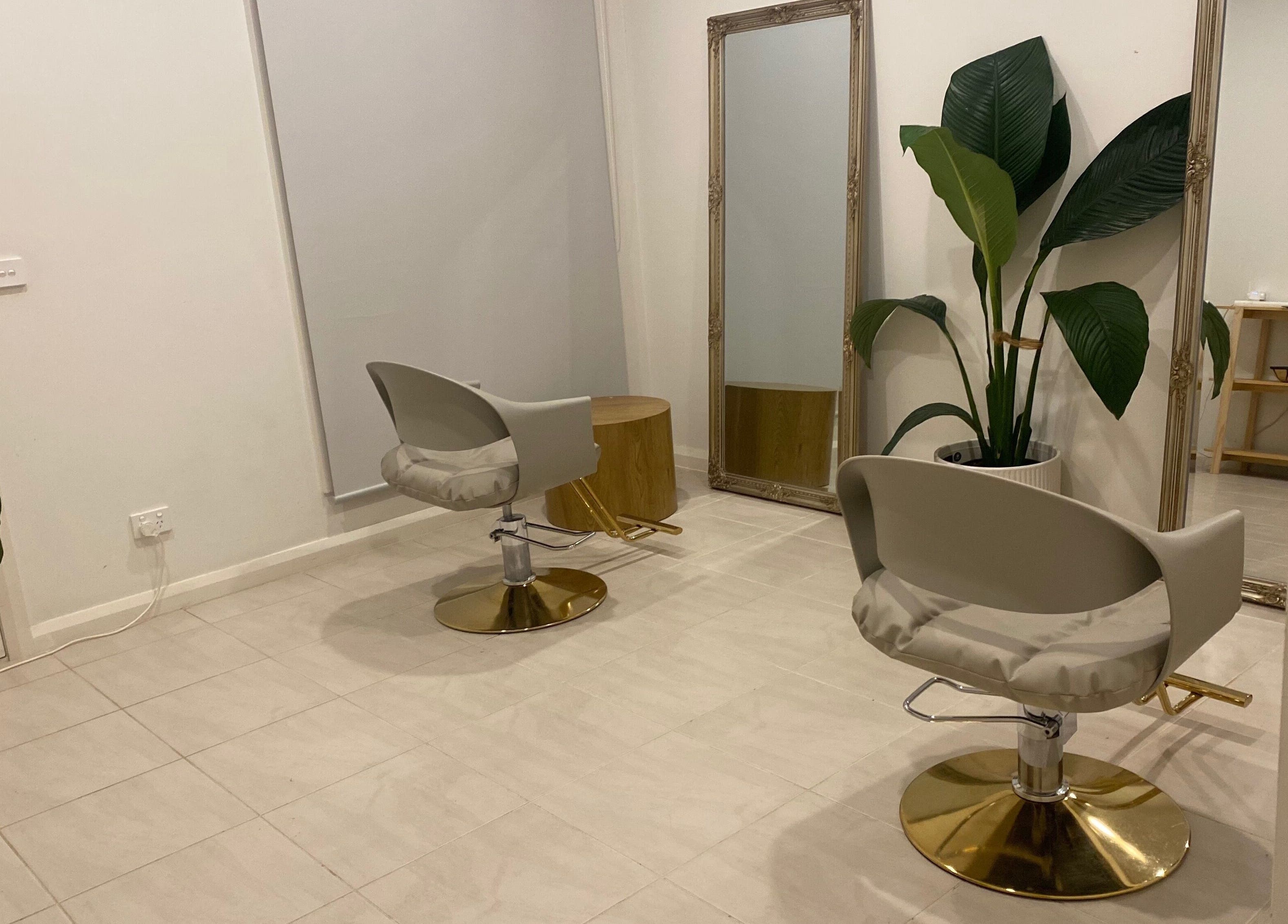 Elegant salon chairs and mirrors at MISSD and Co Salon, Melbourne, Victoria, AU, offering a serene beauty experience.