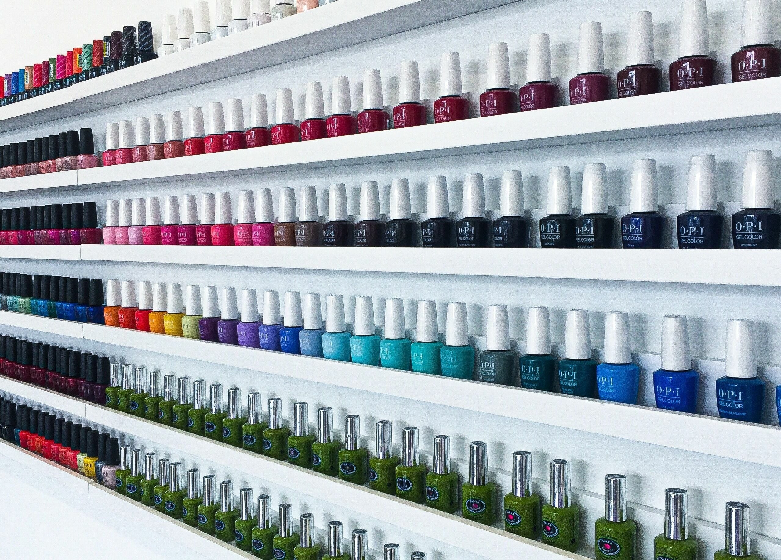 Vibrant nail polish collection at Tmr Nails Bar, Mont-Royal, Québec, CA.