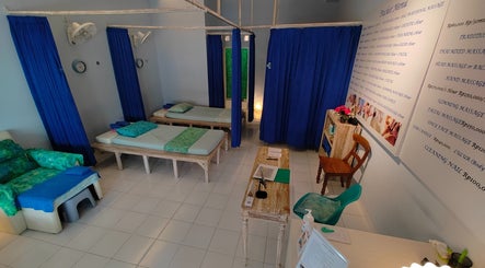 Cozy massage room at Good Massage Sanur Bali, Bali, ID, offering serene relaxation and wellness services.