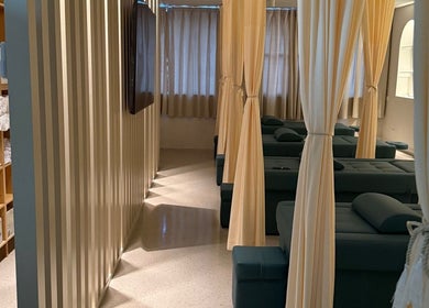 LUX Head and Body Spa's serene private cubicles with cozy lounge chairs in Riverstone, New South Wales, AU.