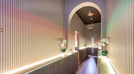 Elegant hallway at Riverstone Thai Massage Therapy and Spa, Riverstone, New South Wales, AU, with soft lighting.