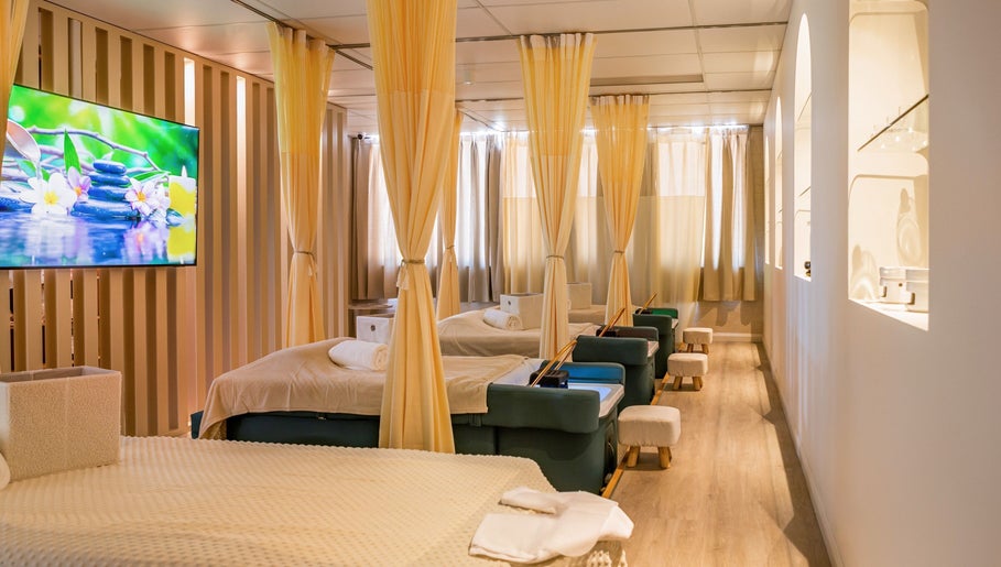 Tranquil massage room at LUX Head and Body Spa in Riverstone, New South Wales, AU, with comfortable beds and soothing decor.