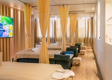 Tranquil massage room at LUX Head and Body Spa in Riverstone, New South Wales, AU, with comfortable beds and soothing decor.