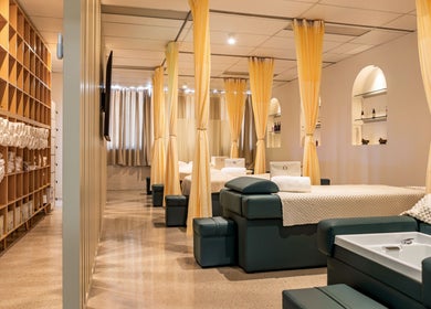 Relaxing treatment area at LUX Head and Body Spa, Riverstone, New South Wales, AU with cozy beds and soft curtains.