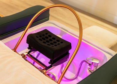 Luxurious foot spa at LUX Head and Body Spa in Riverstone, NSW, AU. Features elegant design and purple lighting.