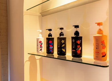Elegant product display at LUX Head and Body Spa, Riverstone, New South Wales, AU, showcasing premium bottles.