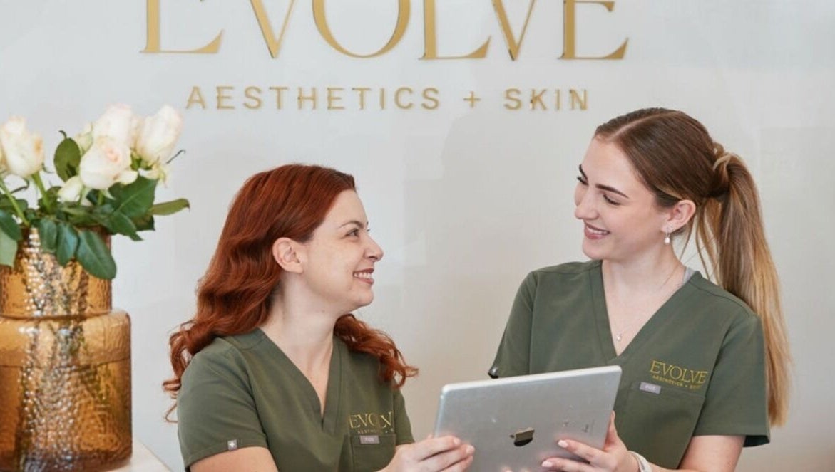 Staff at Evolve Face Skin Body | Carine Aesthetic and Skin Clinic in Duncraig, Western Australia, AU smiling together.