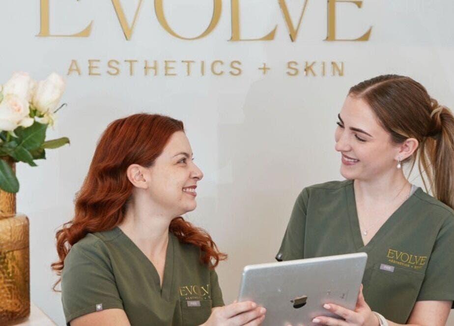 Staff at Evolve Face Skin Body | Carine Aesthetic and Skin Clinic in Duncraig, Western Australia, AU smiling together.