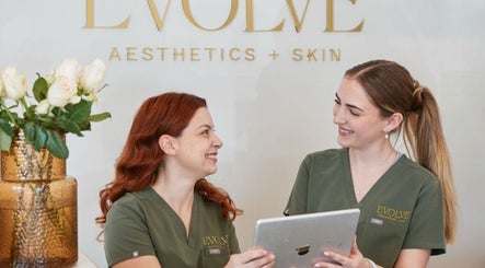 Staff at Evolve Face Skin Body | Carine Aesthetic and Skin Clinic in Duncraig, Western Australia, AU smiling together.