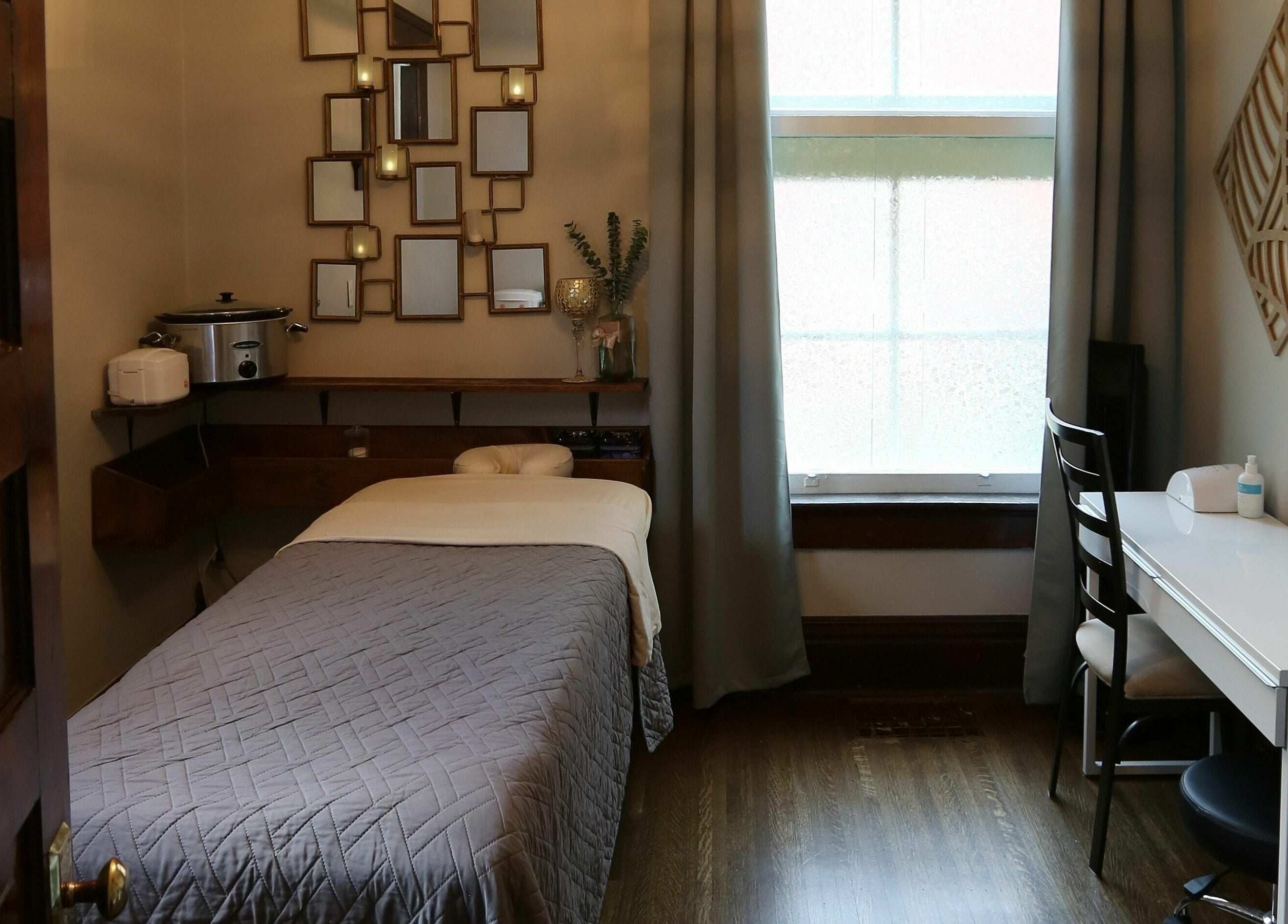 Tranquil massage room at Relish Day Spa, Stratford, Ontario, CA, with elegant decor and soothing ambiance.