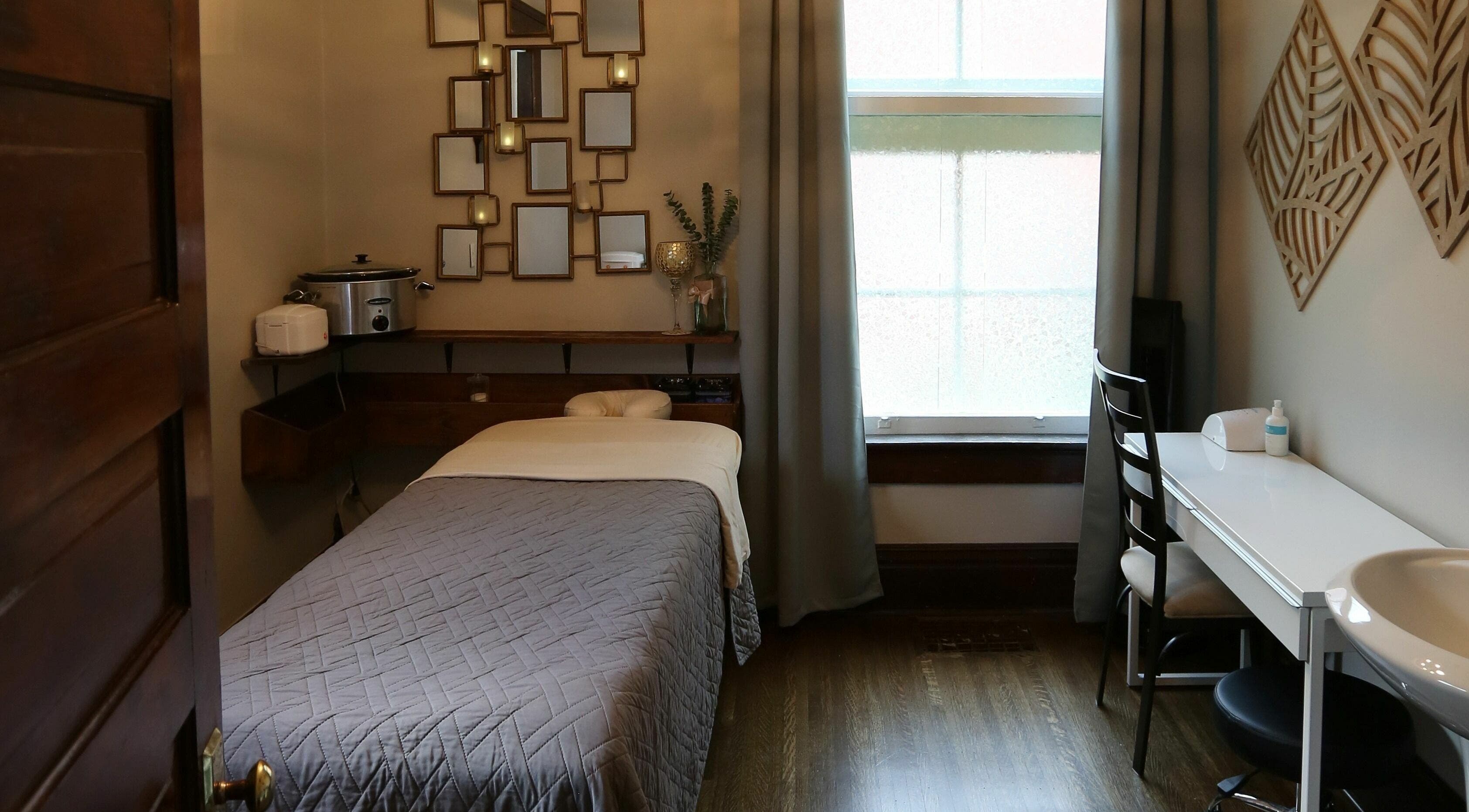 Tranquil massage room at Relish Day Spa, Stratford, Ontario, CA, with elegant decor and soothing ambiance.