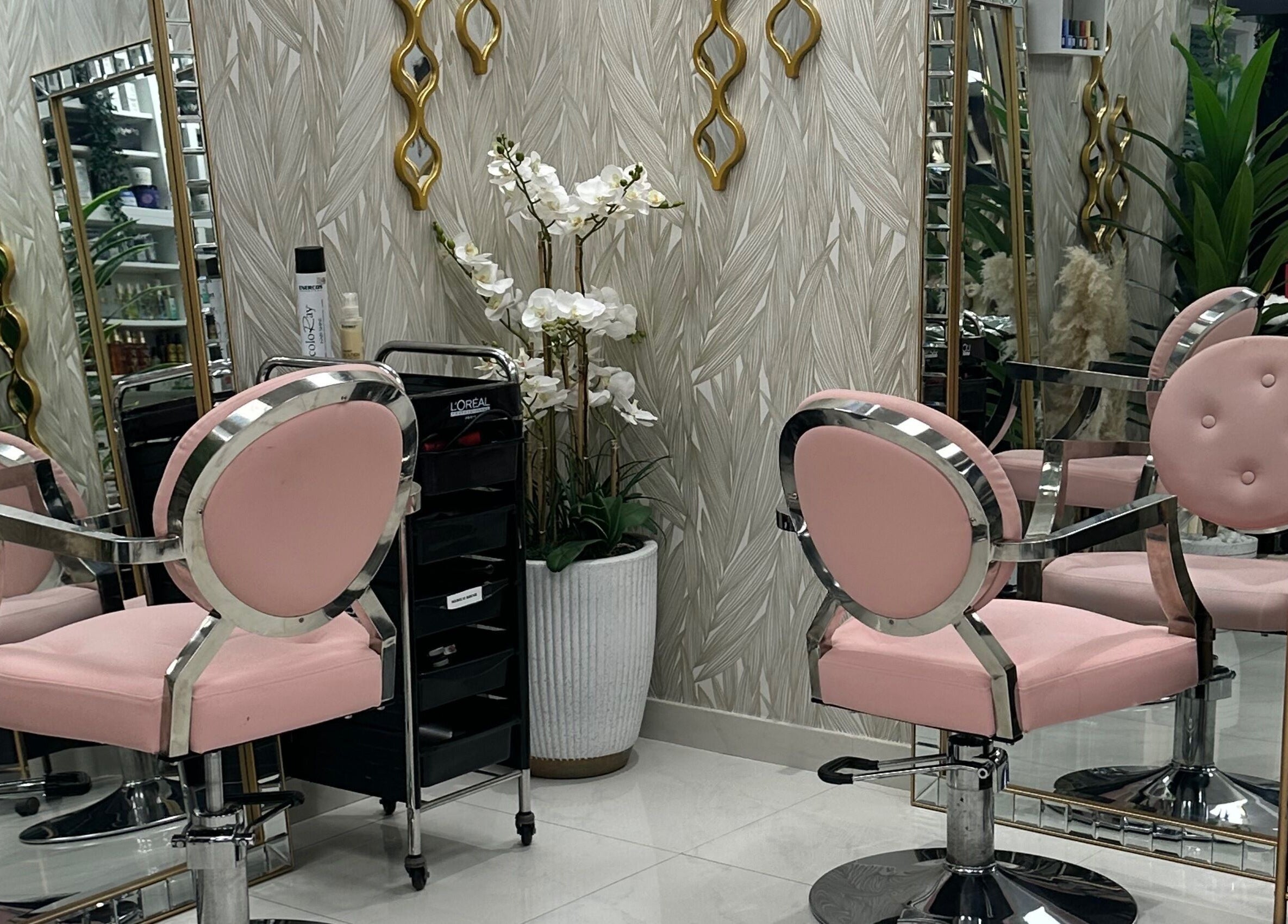 Stylish pink salon chairs at Seleva Beauty Lounge/ Salon JBR, Dubai, Dubai, AE with a chic interior decor.