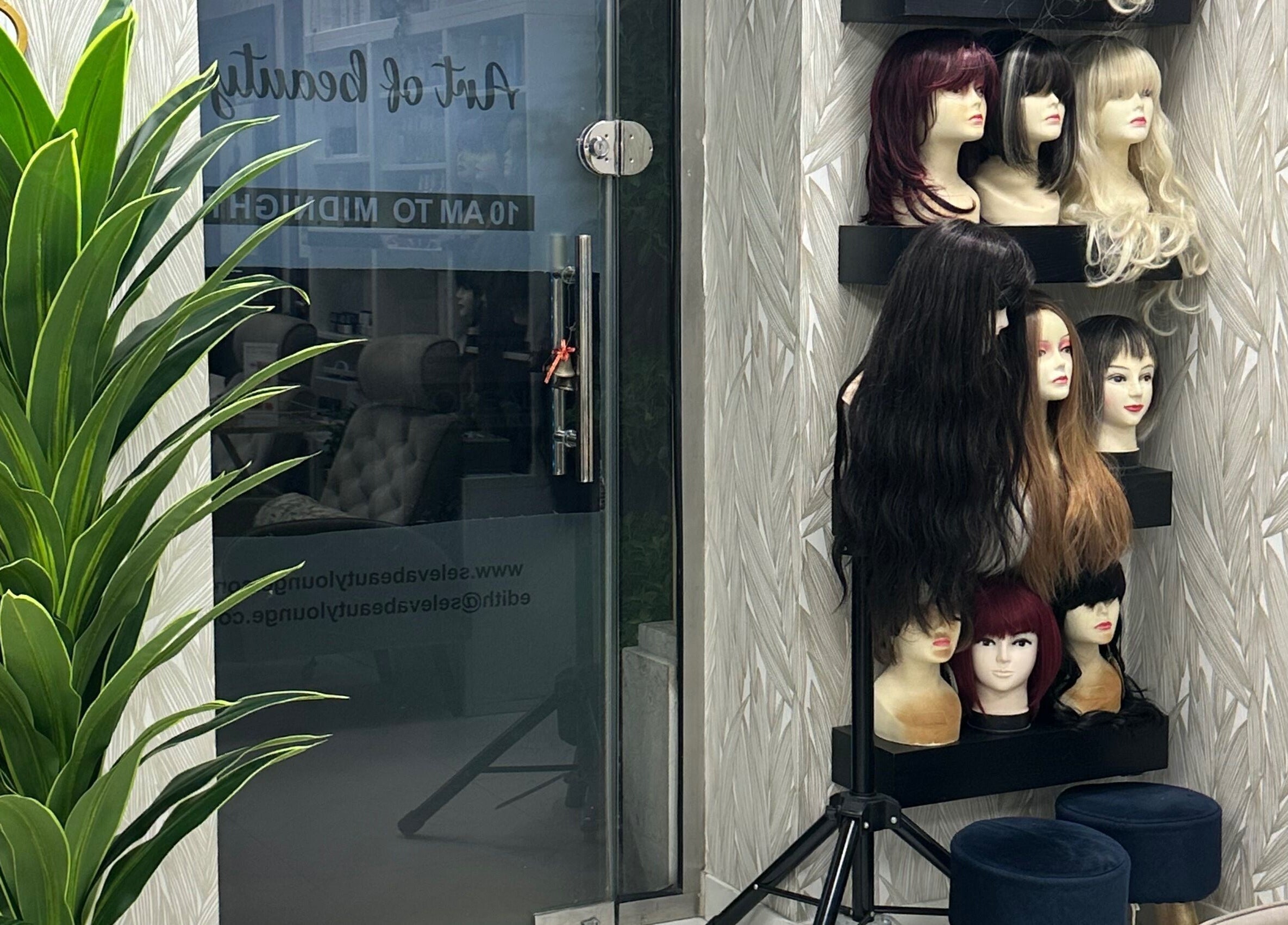 Wig display inside Seleva Beauty Lounge Salon JBR, showcasing elegant hair styling options in Dubai, Dubai, AE.