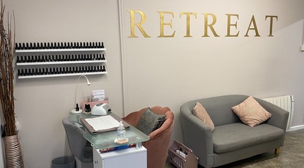 Elegant nail salon setup at The Beauty Room Danebury Practice, Andover, England, GB, featuring cozy seating.
