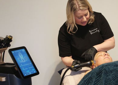 Senses Beauty specialist performing advanced facial treatment in Warwick, England, GB spa setting.