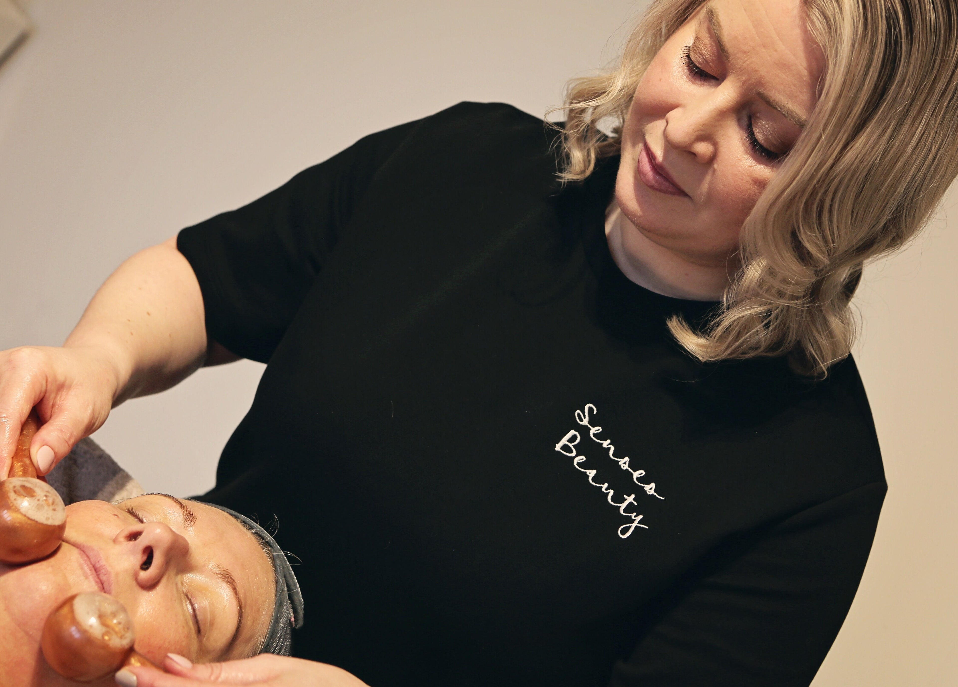 Relaxing facial massage at Senses Beauty, Warwick, England, GB, showcasing expert care and serene ambiance.