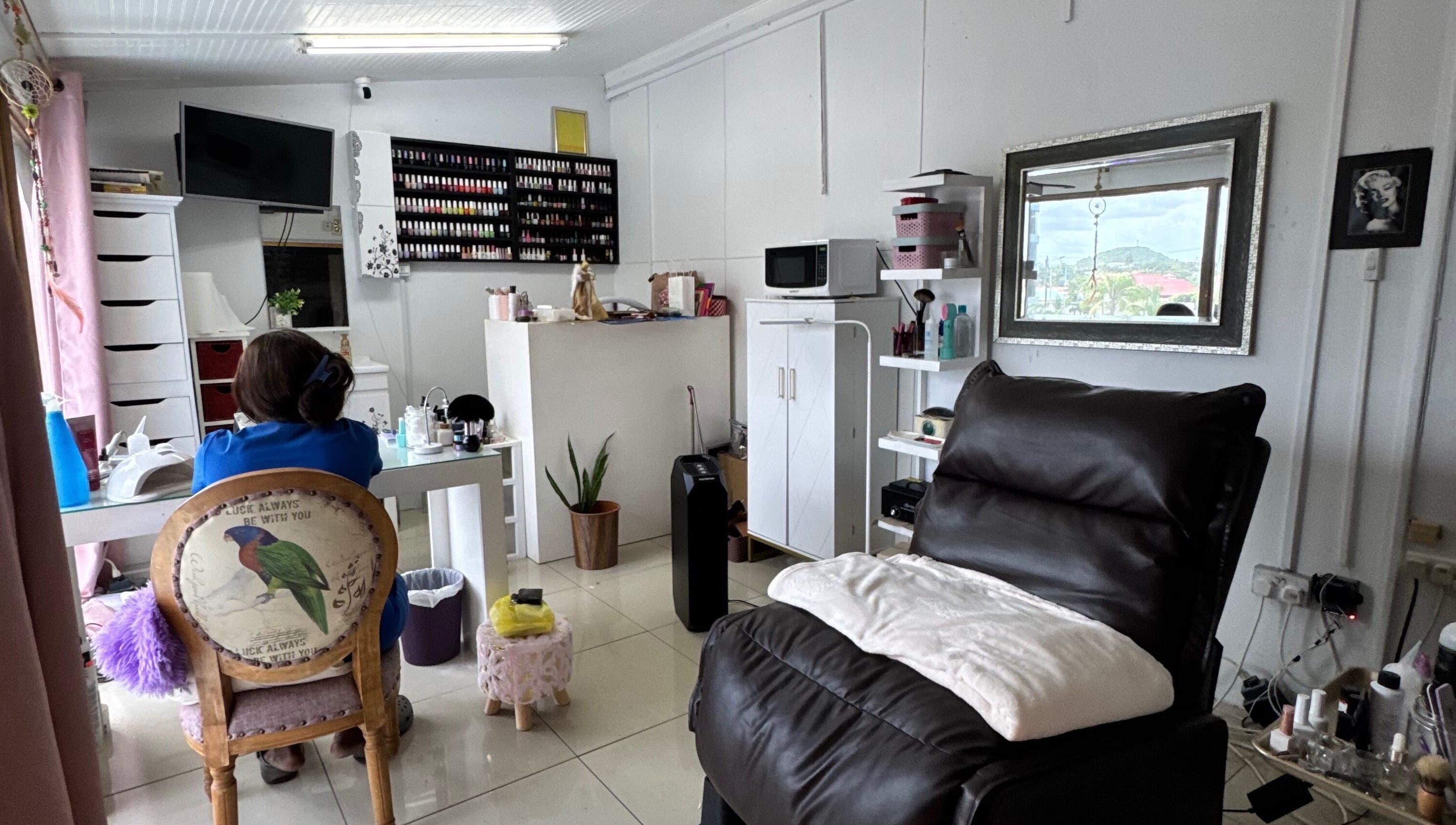 iCandy beauty salon interior with cozy seating in Rodney Bay, Gros Islet, LC showcasing nail and beauty products.