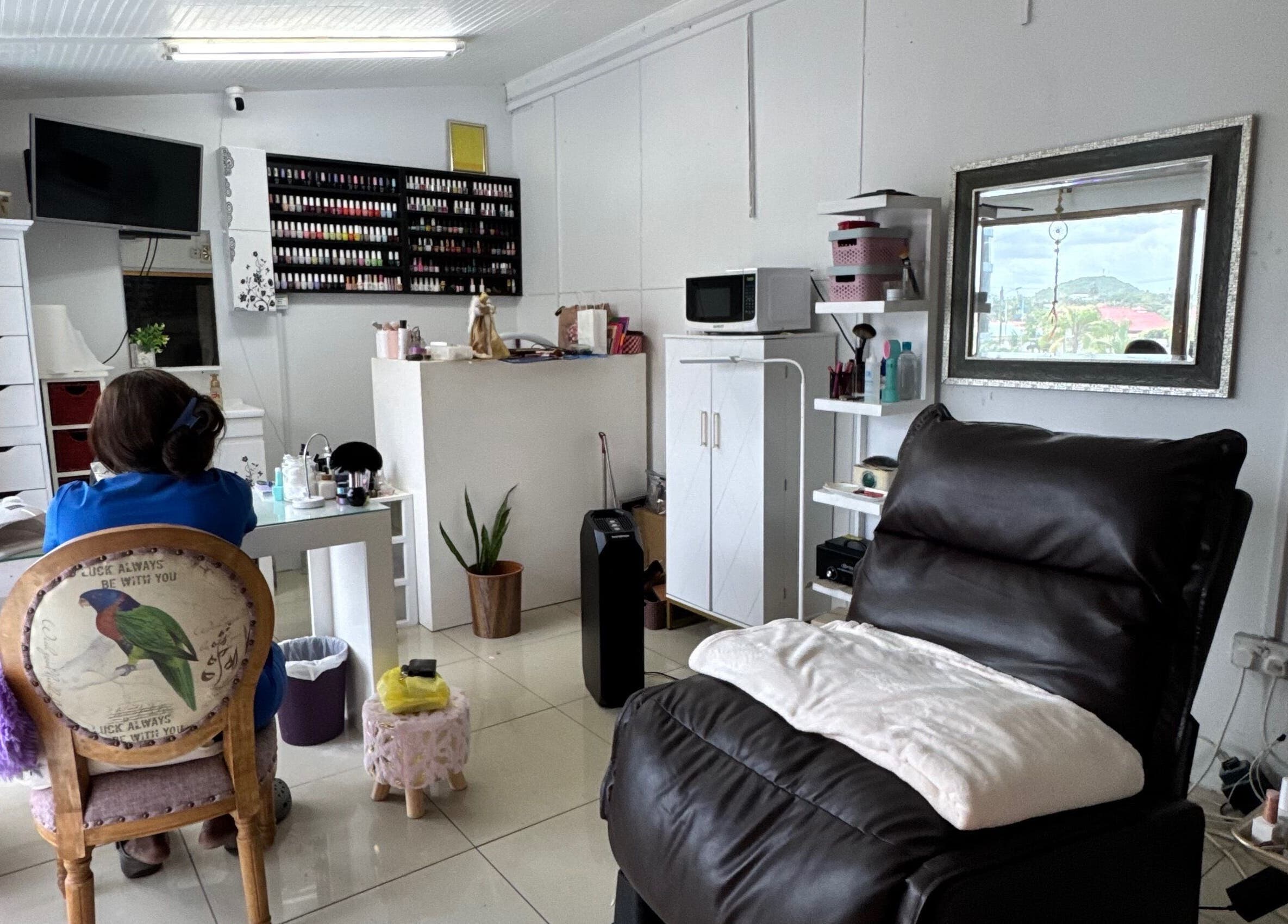 iCandy beauty salon interior with cozy seating in Rodney Bay, Gros Islet, LC showcasing nail and beauty products.