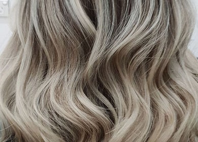 Stylish blonde wavy hair styled at Studio NiCHE, Adelaide, South Australia, AU.
