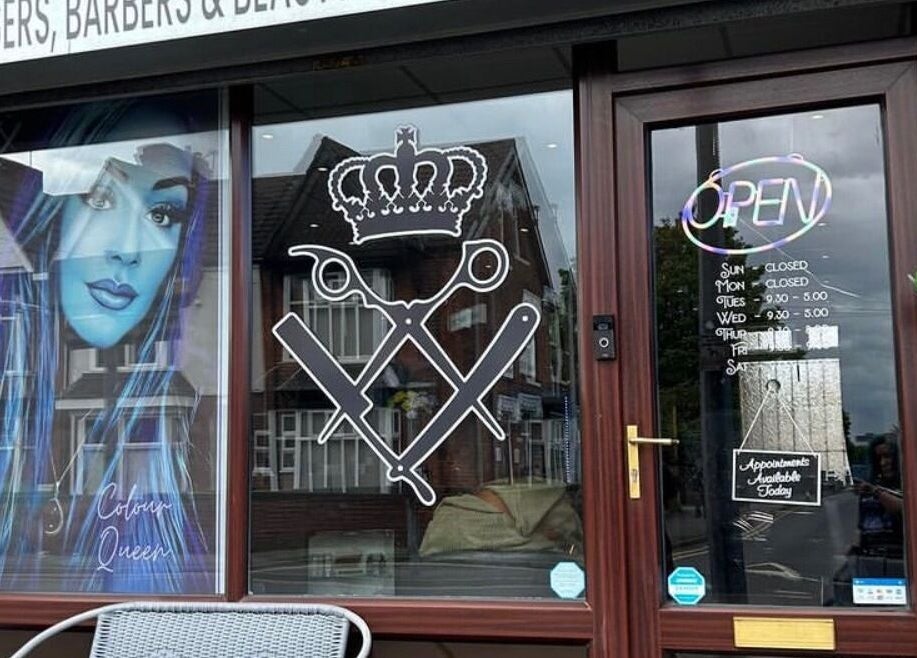 Entrance of Colour Queen salon in Scunthorpe, England, with stylish window graphics and open sign.