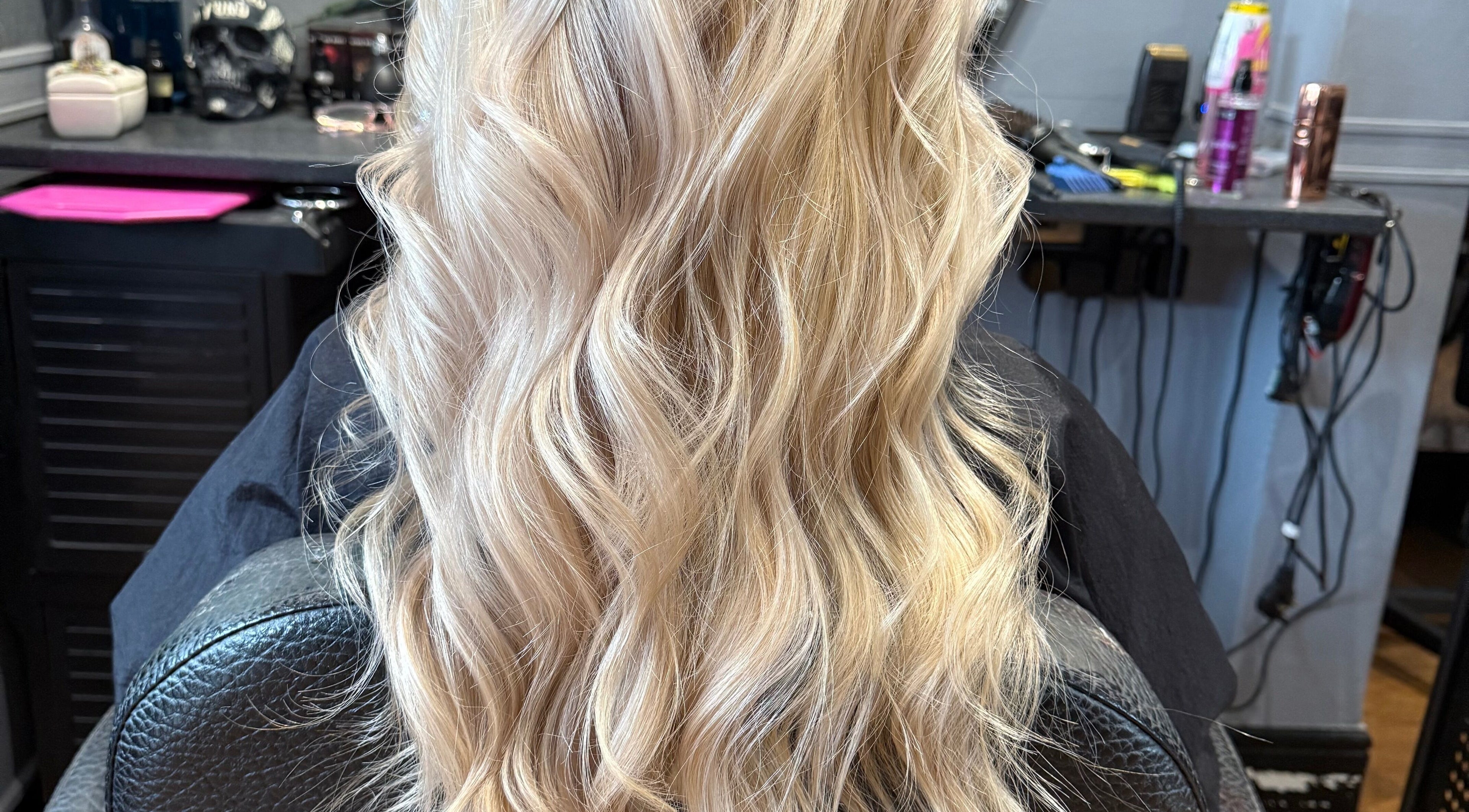 Flowing blonde waves styled at Colour Queen in Scunthorpe, England, GB hair salon.
