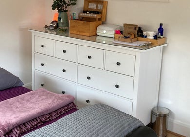 The Relaxation Room Leixlip in County Kildare featuring a calming white dresser with essential oils.