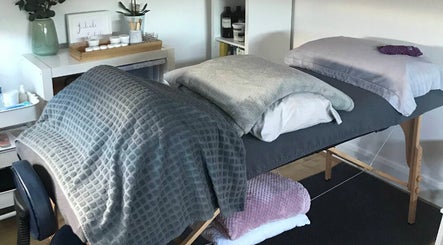Inviting massage table at The Relaxation Room Leixlip, County Kildare, IE, with cozy blankets and serene decor.