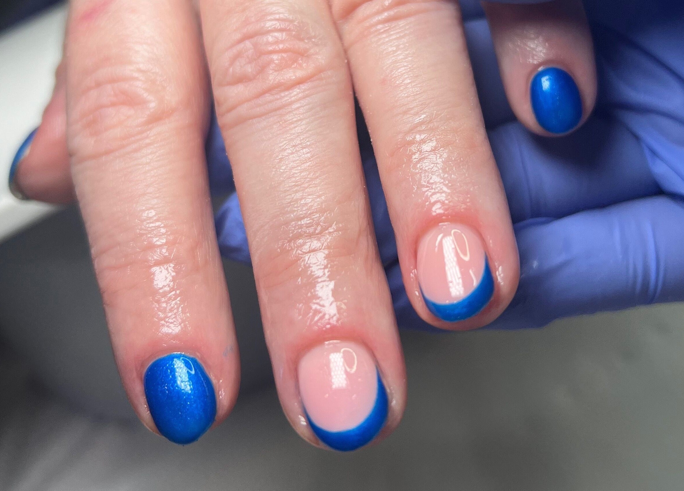 Vibrant blue manicure at Becca Kate Nails in Castlederg, Northern Ireland, GB.