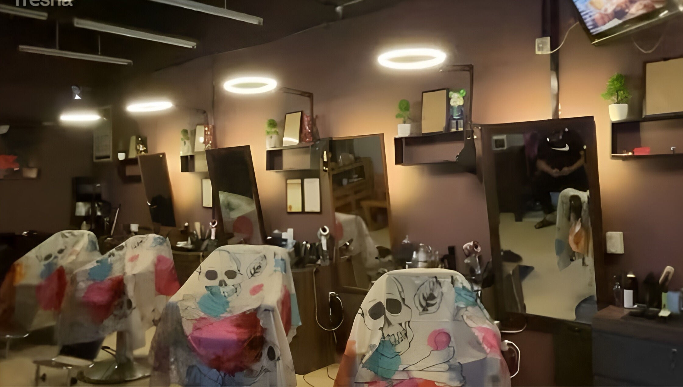 Chic salon interior at Cuts & Cloud Damai in Pontian, Johor, MY with stylish decor and mirrors.