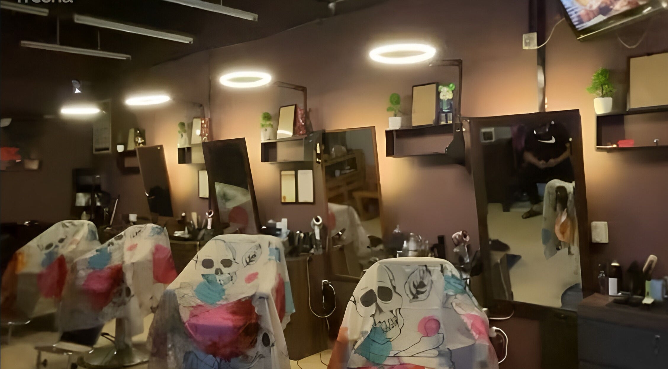 Chic salon interior at Cuts & Cloud Damai in Pontian, Johor, MY with stylish decor and mirrors.
