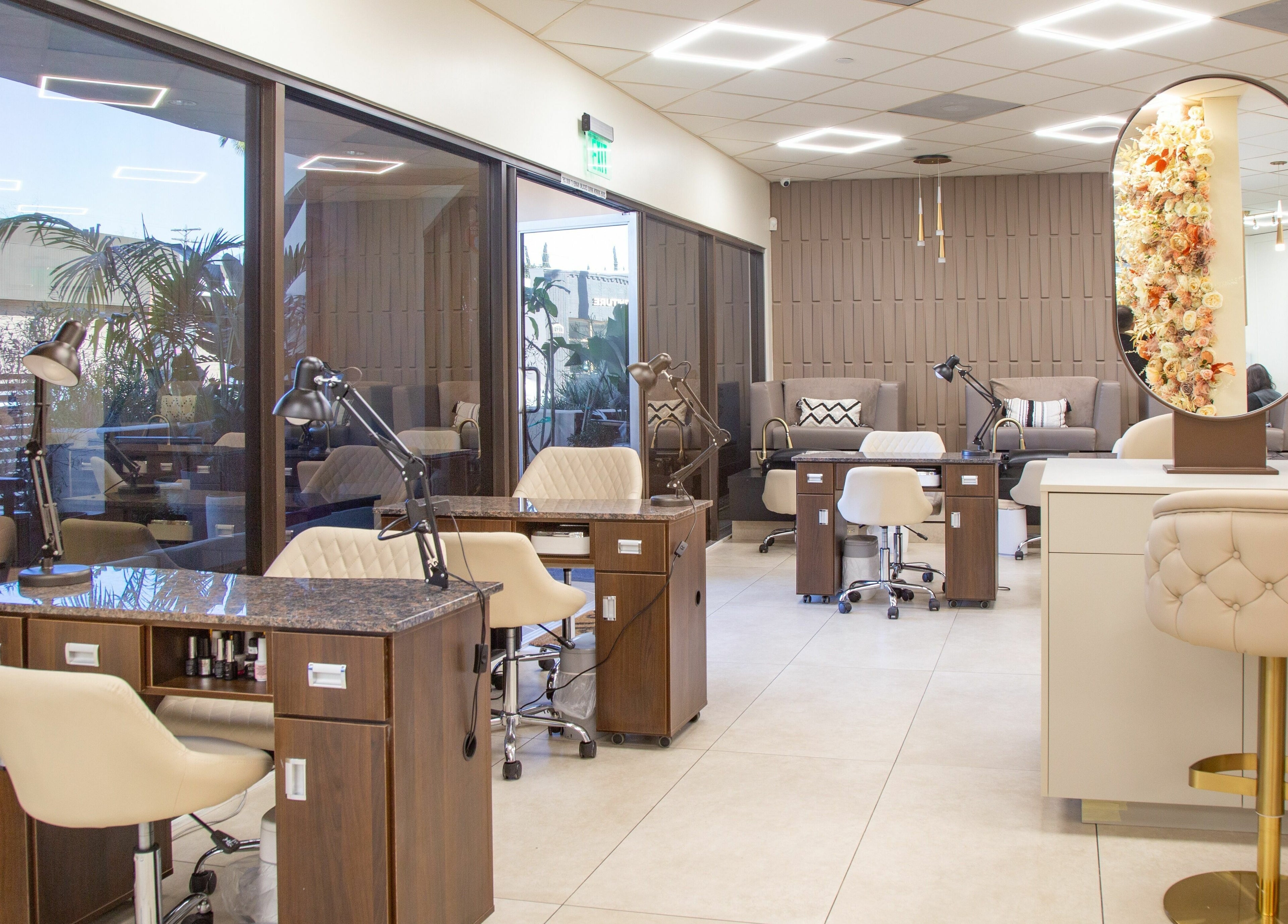 Chic interior of Omorfia Salon and Spa in Glendale, California, US featuring stylish nail stations and decor.