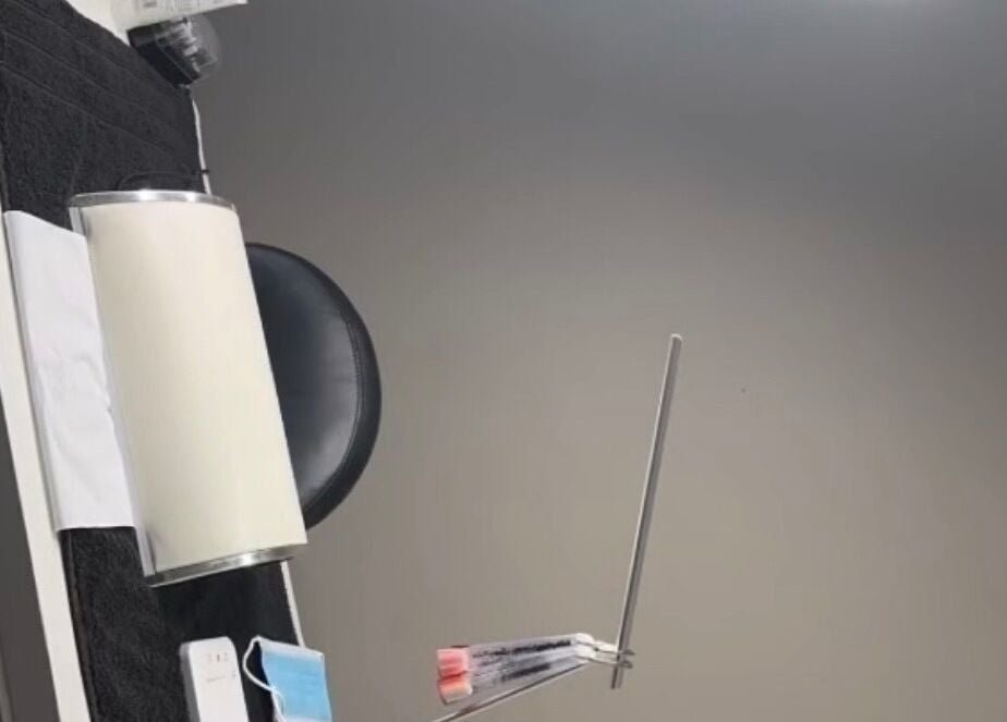 A manicure setup at Backlashedbeautyx, County Donegal, IE featuring tools and a chic chair.