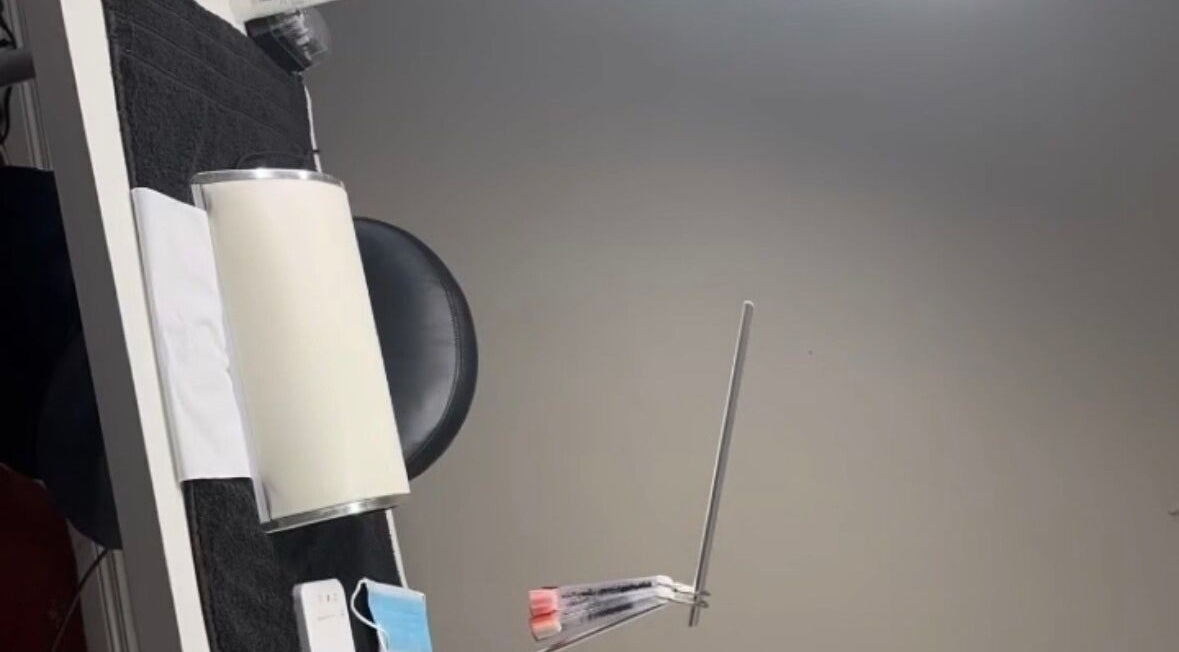 A manicure setup at Backlashedbeautyx, County Donegal, IE featuring tools and a chic chair.