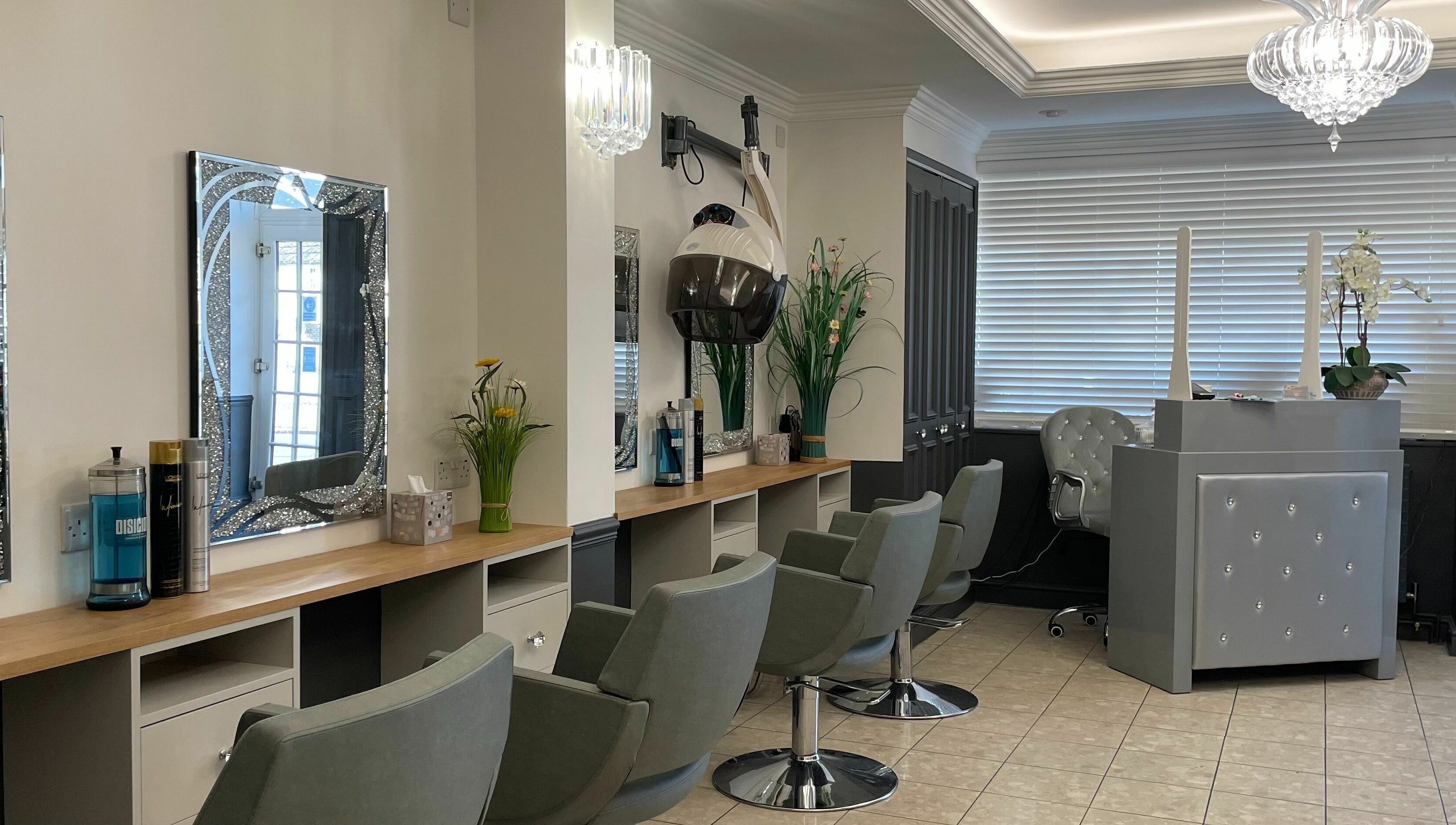Corner Hairdressing salon in Lindfield, England, GB features modern styling chairs and elegant decor.